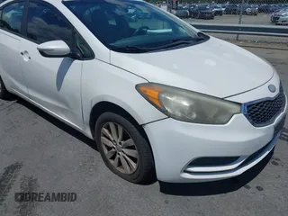 2014 Kia Forte LX with VIN KNAFX4A61E5055158, listed as a IAAI auction lot 42212501 with 224,830 mi miles and . Bid and sale history available at carsss.com. Image 6.