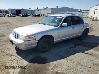 2000 Ford Crown Victoria Police Police Interceptor with VIN 2FAFP71W4YX119755, listed as a Copart auction lot 68950904 with 208,260 mi miles and Salvage Title. Bid and sale history available at carsss.com. Image 1.