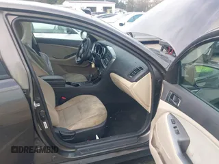 2015 Kia Optima LX with VIN 5XXGM4A72FG400848, listed as a IAAI auction lot 40802198 with 173,270 mi miles and . Bid and sale history available at DreamBid. Image 5.