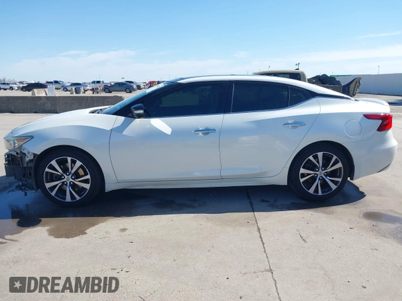 2016 Nissan Maxima SV z VIN 1N4AA6AP8GC436917, wystawiony jako IAAI lot #41691025 z przebiegiem 140 149 mil mil oraz . Historia ofert i sprzedaży dostępna na DreamBid. Obrazek 15.
