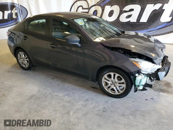2017 Toyota Yaris iA with VIN 3MYDLBYV2HY182999, listed as a Copart auction lot 53694175 with 98,563 mi miles and Clean Title. Bid and sale history available at carsss.com. Image 4.