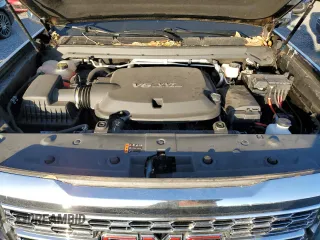 2021 GMC Canyon 2WD Denali with VIN 1GTG5EEN2M1107052, listed as a Copart auction lot 76377704 with 11,696 mi miles and Salvage Title. Bid and sale history available at carsss.com. Image 11.