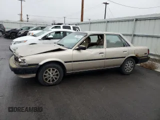 1991 Toyota Camry z VIN 4T1SV24E0MU379572, wystawiony jako Copart lot #78090294 z przebiegiem 242 052 mil mil oraz Szkoda całkowita • Salvage title. Historia ofert i sprzedaży dostępna na DreamBid. Obrazek 1.