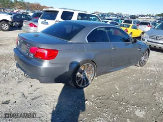2011 BMW M3 with VIN WBSDX9C57BE584727, listed as a IAAI auction lot 40921043 with 148,068 mi miles. Bid and sale history available at carsss.com. Image 4.