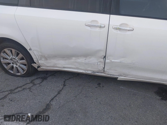 2015 Toyota Sienna Ltd with VIN 5TDDK3DC8FS100841, listed as a IAAI auction lot 41539557 with 219,816 mi miles. Bid and sale history available at carsss.com. Image 6.