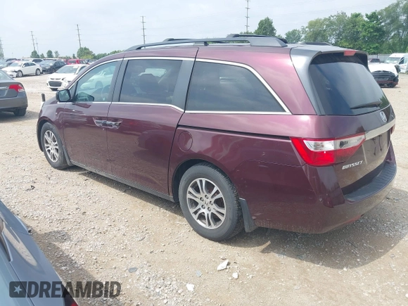 2011 Honda Odyssey EX-L with VIN 5FNRL5H6XBB096891, listed as a IAAI auction lot 42840531 with 214,842 mi miles and . Bid and sale history available at DreamBid. Image 3.