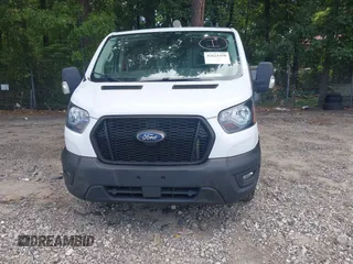 2023 Ford Transit Cargo z VIN 1FTYE1Y82PKA83403, wystawiony jako IAAI lot #42621450 z przebiegiem 44 617 mil mil oraz . Historia ofert i sprzedaży dostępna na DreamBid. Obrazek 12.