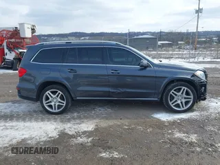 2014 Mercedes-Benz GL-Class GL 550 with VIN 4JGDF7DE3EA321574, listed as a IAAI auction lot 41598200 with 93,190 mi miles. Bid and sale history available at carsss.com. Image 14.