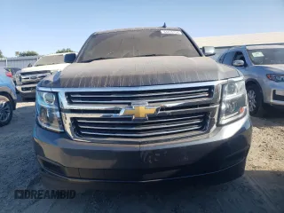 2019 Chevrolet Suburban LS z VIN 1GNSCGKCXKR156097, wystawiony jako Copart lot #64475154 z przebiegiem 101 739 mil mil oraz Nie do naprawy • Non repairable. Historia ofert i sprzedaży dostępna na DreamBid. Obrazek 5.