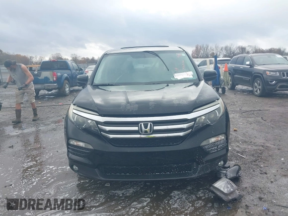 2016 Honda Pilot EX-L with VIN 5FNYF5H56GB031831, listed as a IAAI auction lot 41111342 with 244,197 mi miles and . Bid and sale history available at DreamBid. Image 12.