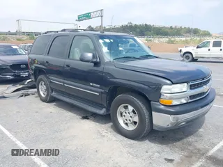 2003 Chevrolet Tahoe LS z VIN 1GNEC13T13R220814, wystawiony jako IAAI lot #42109238 z przebiegiem 119 040 mil mil oraz . Historia ofert i sprzedaży dostępna na DreamBid. Obrazek 1.