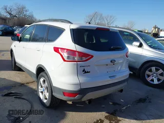 2013 Ford Escape SE with VIN 1FMCU9GXXDUB02618, listed as a IAAI auction lot 41734363 with 198,264 mi miles. Bid and sale history available at carsss.com. Image 3.