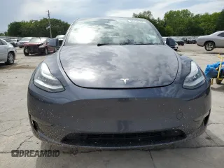 2021 Tesla Model Y Long Range z VIN 5YJYGDEE9MF067651, wystawiony jako Copart lot #55758165 z przebiegiem 61 348 mil mil oraz Czysty tytuł • Clean title. Historia ofert i sprzedaży dostępna na DreamBid. Obrazek 5.