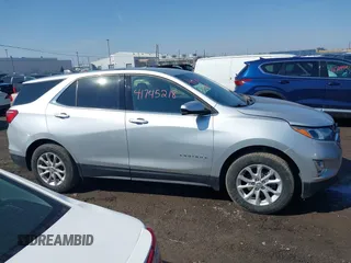 2019 Chevrolet Equinox LT with VIN 3GNAXUEV5KS670478, listed as a IAAI auction lot 41745218 with 56,996 mi miles and . Bid and sale history available at DreamBid. Image 13.