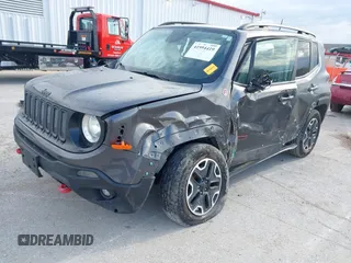 2017 Jeep Renegade Deserthawk with VIN ZACCJBCB2HPF51653, listed as a IAAI auction lot 41994419 with 115,444 mi miles and . Bid and sale history available at DreamBid. Image 2.