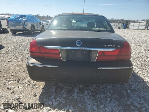 2003 Mercury Grand Marquis GS Convenience with VIN 2MEFM74W03X638534, listed as a Copart auction lot 49371535 with 335,360 mi miles and Salvage Title. Bid and sale history available at DreamBid. Image 6.