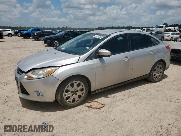 2012 Ford Focus SE with VIN 1FAHP3F29CL287498, listed as a Copart auction lot 61476855 with 139,801 mi miles and Salvage title. Bid and sale history available at DreamBid. Image 1.