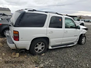 2001 GMC Yukon Denali z VIN 1GKEK63U01J287101, wystawiony jako Copart lot #43659115 z przebiegiem Nie podano mil oraz Szkoda całkowita • Salvage title. Historia ofert i sprzedaży dostępna na DreamBid. Obrazek 3.