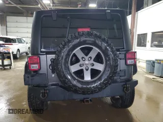 2016 Jeep Wrangler Unlimited Sport с VIN 1C4BJWDG2GL158106, выставлен на аукционе Copart как лот 59557565 с пробегом 114 242 миль миль и Списание • Salvage title. История ставок и продаж доступна на DreamBid. Изображение 6.