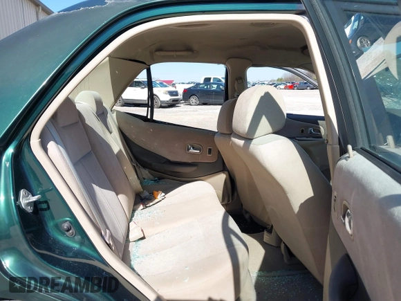 2001 Mazda Protege LX with VIN JM1BJ225310404647, listed as a IAAI auction lot 41480466 with 115,606 mi miles and . Bid and sale history available at carsss.com. Image 8.