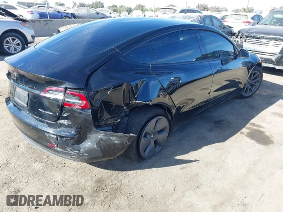 2022 Tesla Model 3 Long Range with VIN 5YJ3E1EB1NF313954, listed as a IAAI auction lot 41248187 with 31,247 mi miles and . Bid and sale history available at DreamBid. Image 4.