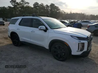 2023 Hyundai Palisade XRT z VIN KM8R34GE6PU544959, wystawiony jako Copart lot #50988815 z przebiegiem 32 057 mil mil oraz Szkoda całkowita • Salvage title. Historia ofert i sprzedaży dostępna na DreamBid. Obrazek 4.