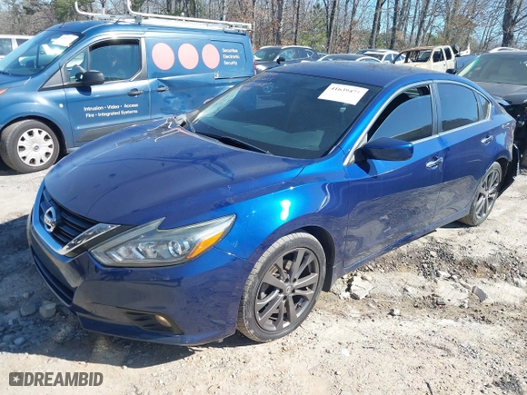 2018 Nissan Altima 2.5 SL with VIN 1N4AL3AP1JC294068, listed as a IAAI auction lot 41639471 with 100,772 mi miles. Bid and sale history available at carsss.com. Image 18.