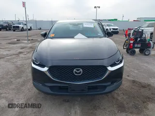 2021 Mazda CX-30 2.5 S with VIN 3MVDMAAL2MM303321, listed as a IAAI auction lot 41583346 with 57,122 mi miles. Bid and sale history available at carsss.com. Image 12.