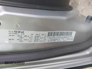 2019 Dodge Grand Caravan GT with VIN 2C4RDGEG0KR640664, listed as a IAAI auction lot 42002230 with 73,591 mi miles and . Bid and sale history available at DreamBid. Image 9.
