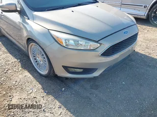 2015 Ford Focus SE with VIN 1FADP3K23FL261021, listed as a IAAI auction lot 42014802 with 157,283 mi miles. Bid and sale history available at carsss.com. Image 6.