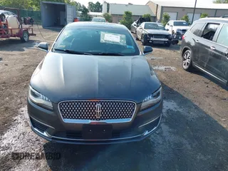 2017 Lincoln MKZ Select z VIN 3LN6L5D98HR613305, wystawiony jako IAAI lot #42400840 z przebiegiem 81 659 mil mil oraz . Historia ofert i sprzedaży dostępna na DreamBid. Obrazek 12.