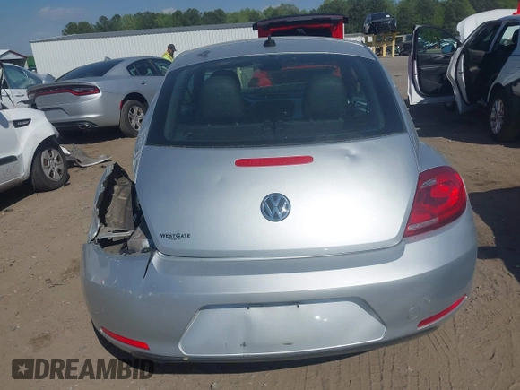 2014 Volkswagen Beetle 2.5L w/Sun with VIN 3VWJP7AT7EM633386, listed as a IAAI auction lot 42060290 with 273,374 mi miles and . Bid and sale history available at DreamBid. Image 17.