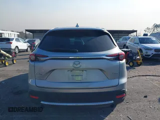 2017 Mazda CX-9 Grand Touring with VIN JM3TCADY5H0138176, listed as a IAAI auction lot 41458610 with 114,664 mi miles and . Bid and sale history available at DreamBid. Image 16.