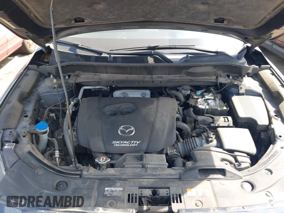 2017 Mazda CX-5 Touring z VIN JM3KFBCL5H0133493, wystawiony jako IAAI lot #39666644 z przebiegiem 125 048 mil mil oraz . Historia ofert i sprzedaży dostępna na DreamBid. Obrazek 10.