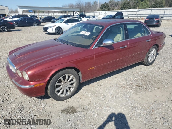 2005 Jaguar XJ Vanden Plas z VIN SAJWA82C75SG33074, wystawiony jako Copart lot #48725755 z przebiegiem 129 817 mil mil oraz Czysty tytuł • Clean title. Historia ofert i sprzedaży dostępna na DreamBid. Obrazek 1.