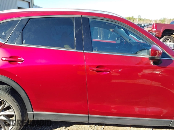 2020 Mazda CX-5 Grand Touring with VIN JM3KFADM8L0846818, listed as a IAAI auction lot 41224843 with 123,554 mi miles. Bid and sale history available at carsss.com. Image 14.