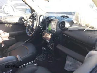 2013 MINI Countryman S z VIN WMWZC3C57DWP22928, wystawiony jako IAAI lot #41665753 z przebiegiem Nie podano mil oraz . Historia ofert i sprzedaży dostępna na DreamBid. Obrazek 5.