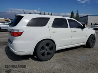 2013 Dodge Durango R/T with VIN 1C4SDHCT2DC559006, listed as a Copart auction lot 49275695 with 117,323 mi miles and Salvage title. Bid and sale history available at DreamBid. Image 3.