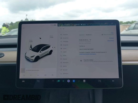 2021 Tesla Model Y Long Range with VIN 5YJYGDEE7MF198867, listed as a IAAI auction lot 42117463 with 79,759 mi miles and . Bid and sale history available at DreamBid. Image 18.
