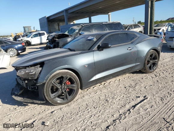 2021 Chevrolet Camaro 1LT with VIN 1G1FB1RX2M0103137, listed as a Copart auction lot 44042855 with 57,068 mi miles and Salvage Title. Bid and sale history available at carsss.com. Image 1.
