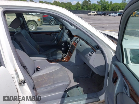 2002 Mercedes-Benz E-Class with VIN WDBJF65J22B432263, listed as a IAAI auction lot 42130545 with 220,852 mi miles. Bid and sale history available at carsss.com. Image 5.