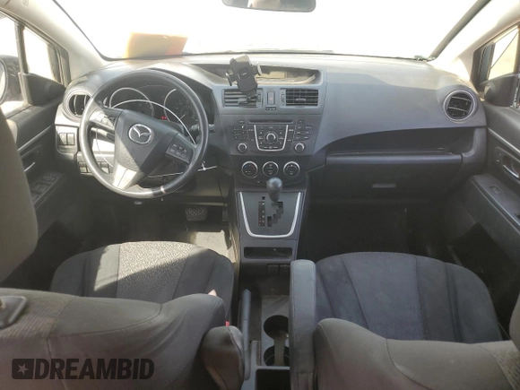 2012 Mazda 5 Sport with VIN JM1CW2BL2C0143227, listed as a Copart auction lot 71596794 with 231,473 mi miles and Salvage Title. Bid and sale history available at DreamBid. Image 8.