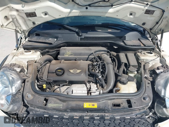 2013 MINI Convertible S with VIN WMWZP3C51DT297843, listed as a IAAI auction lot 41527353 with 127,827 mi miles and . Bid and sale history available at DreamBid. Image 10.