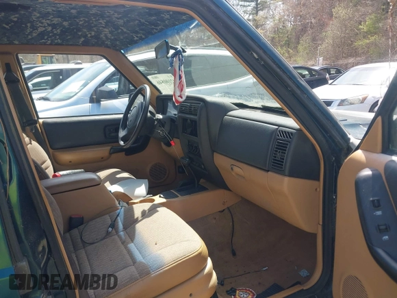 1998 Jeep Cherokee Sport with VIN 1J4FJ68S6WL151698, listed as a IAAI auction lot 42100846 with 239,466 mi miles. Bid and sale history available at carsss.com. Image 5.