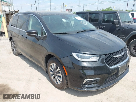 2023 Chrysler Pacifica Hybrid Touring L with VIN 2C4RC1L75PR592251, listed as a IAAI auction lot 42037873 with 44,428 mi miles and . Bid and sale history available at DreamBid. Image 1.