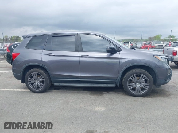 2020 Honda Passport EX-L z VIN 5FNYF8H5XLB018060, wystawiony jako IAAI lot #41961243 z przebiegiem 60 575 mil mil oraz . Historia ofert i sprzedaży dostępna na DreamBid. Obrazek 13.
