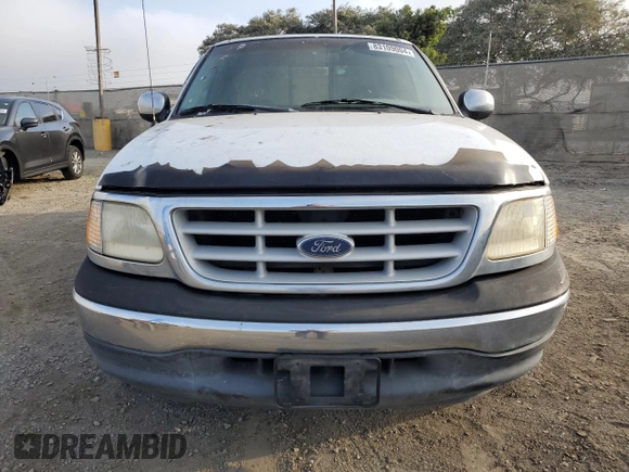 1999 Ford F-150 XL with VIN 1FTRX17L6XNA06844, listed as a Copart auction lot 83109004 with Not Provided miles and Salvage Title. Bid and sale history available at carsss.com. Image 5.