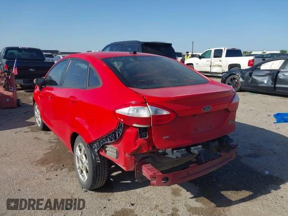 2014 Ford Fiesta SE with VIN 3FADP4BJ9EM174329, listed as a IAAI auction lot 42003743 with 86,744 mi miles. Bid and sale history available at carsss.com. Image 3.
