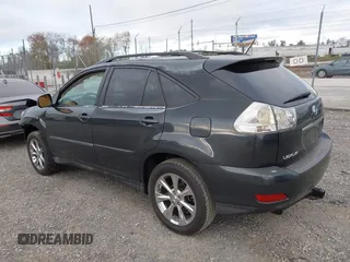 2005 Lexus RX with VIN 2T2GA31U65C040798, listed as a IAAI auction lot 41906233 with 211,026 mi miles. Bid and sale history available at carsss.com. Image 3.
