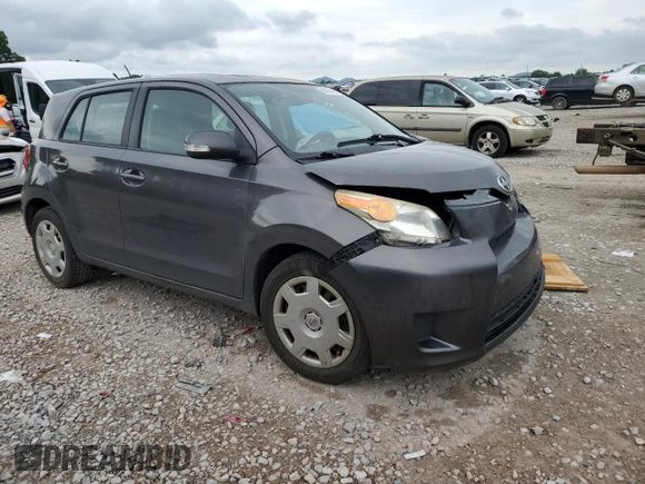 2009 Scion xD with VIN JTKKU10499J045881, listed as a Copart auction lot 60923855 with 125,762 mi miles and Salvage title. Bid and sale history available at DreamBid. Image 4.